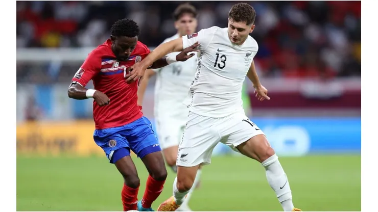 Keysher Fuller of Costa Rica battles for possession with Liberato Cacace of New Zealand