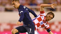 Antoine Griezmann of France and Luka Modric of Croatia