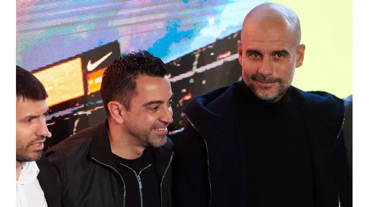 Xavi Hernandez of Barcelona and Pep Guardiola of Manchester City
