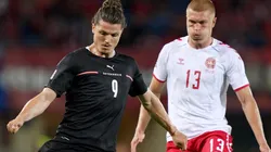 Marcel Sabitzer of Austria and Rasmus Kristensen of Denmark