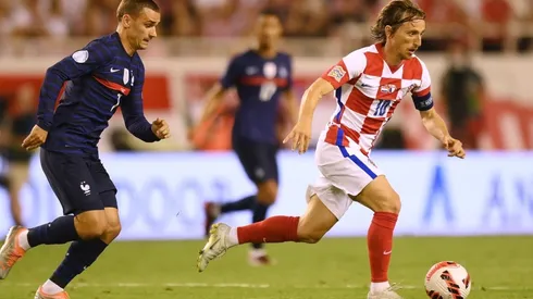 Antoine Griezmann (left) and Luka Modric.