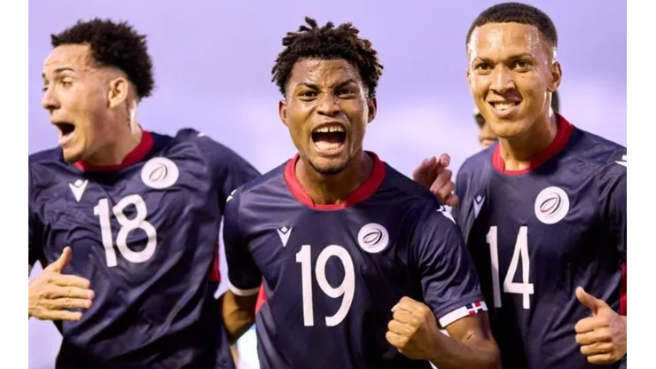 Dorny Romero of Dominican Republic celebrates with his teammates