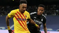 Pierre Emerick Aubameyang of Barcelona and Militao of Real Madrid