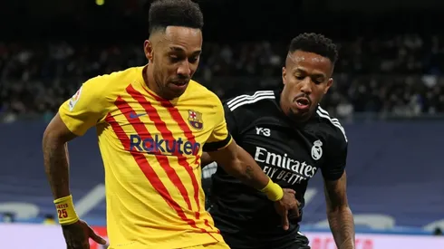 Pierre Emerick Aubameyang of Barcelona and Militao of Real Madrid