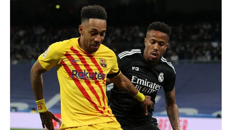 Pierre Emerick Aubameyang of Barcelona and Militao of Real Madrid