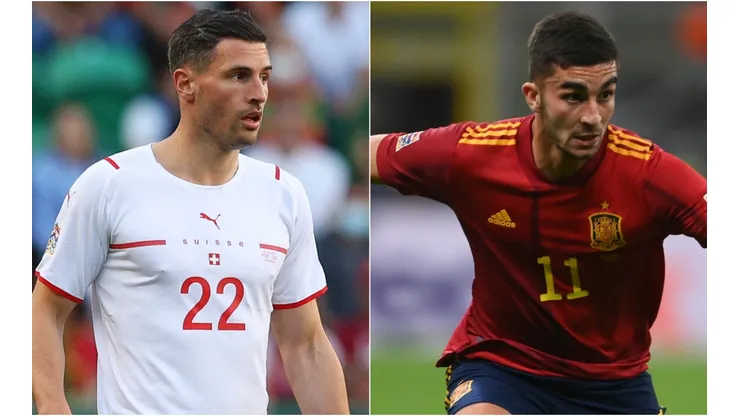 Fabian Schar of Switzerland and Ferran Torres of Spain