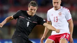 Marcel Sabitzer of Austria and Rasmus Kristensen of Denmark