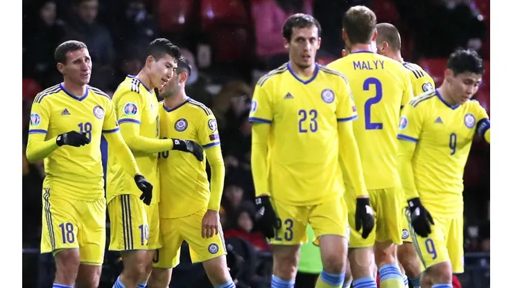 Kazakhstan players celebrate after scoring