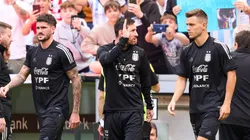 Rodrigo De Paul (left), Lionel Messi (c) and Giovani Lo Celso of Argentina.