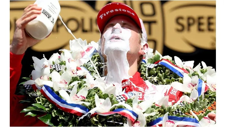 Marcus Ericsson does the traditional Indy 500 celebration
