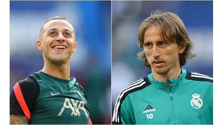 Thiago Alcantara of Liverpool and Luka Modric of Real Madrid