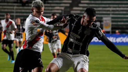 Sergio Adrian of Always Ready and Renato Augusto of Corinthians