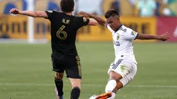 Efrain Alvarez of Los Angeles Galaxy controls the ball as Ilie Sanchez of Los Angeles FC defends