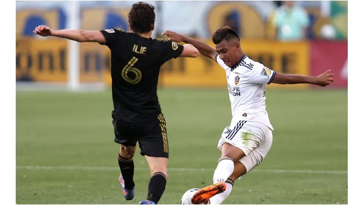 Efrain Alvarez of Los Angeles Galaxy controls the ball as Ilie Sanchez of Los Angeles FC defends