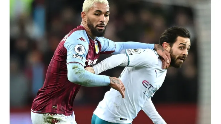 Douglas Luiz of Aston Villa and Bernardo Silva of Manchester City