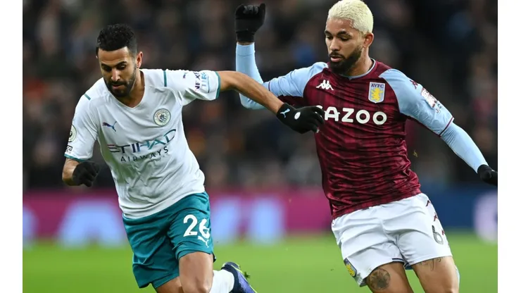 Riyad Mahrez of Manchester City and Douglas Luiz of Aston Villa