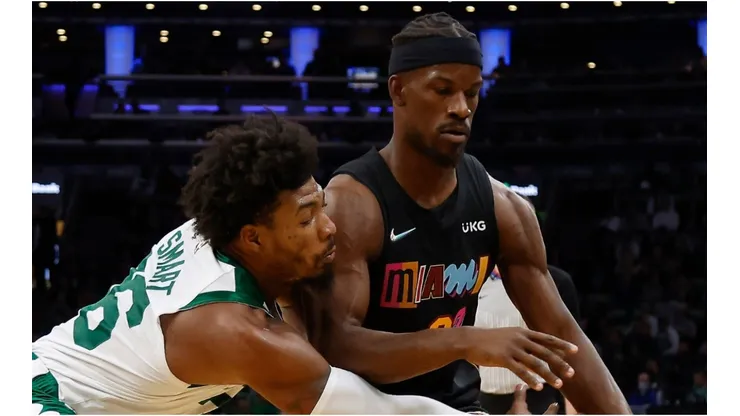 Marcus Smart of the Boston Celtics against Jimmy Butler of the Miami Heat