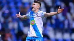 Israel Reyes of Puebla celebrates after scoring a penalty