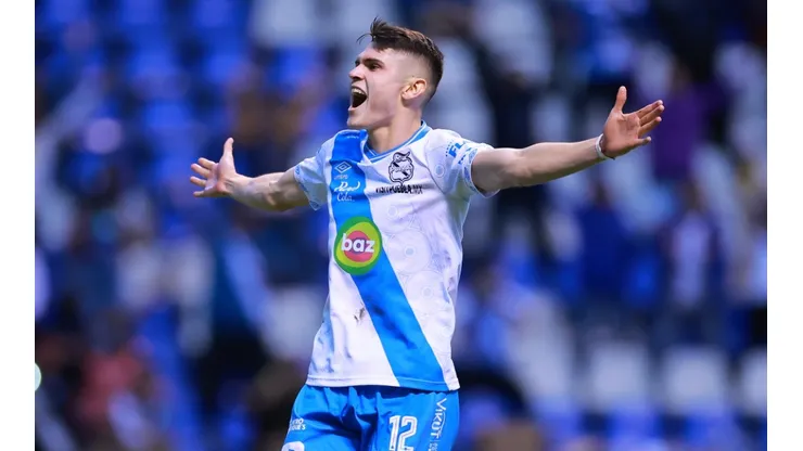 Israel Reyes of Puebla celebrates after scoring a penalty
