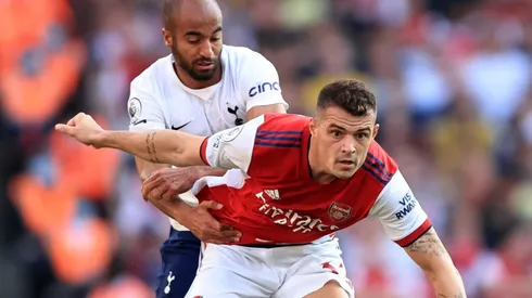 Lucas Moura of Tottenham and Granit Xhaka of Arsenal