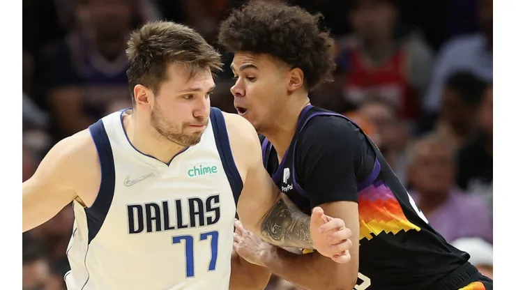 Luka Doncic of the Dallas Mavericks against Cameron Johnson of the Phoenix Suns