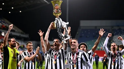 Juventus FC celebrates with the 2020-2021 Coppa Italia trophy