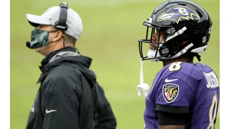 Head coach Harbaugh and Quarterback Lamar Jackson