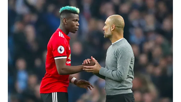 Paul Pogba and Manchester City manager Pep Guardiola