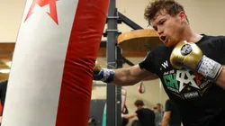Canelo Alvarez, smashing a boxing bag
