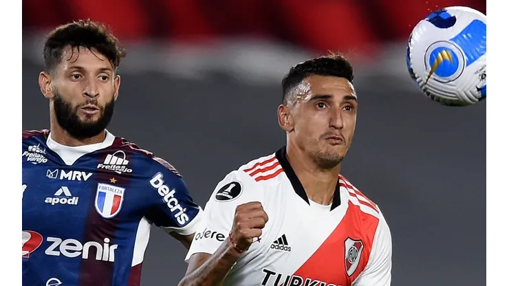 Matias Exequiel Suarez (R) of River Plate and Juninho Capixaba of Fortaleza