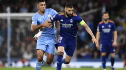 Rodri of Manchester City and Karim Benzema of Real Madrid