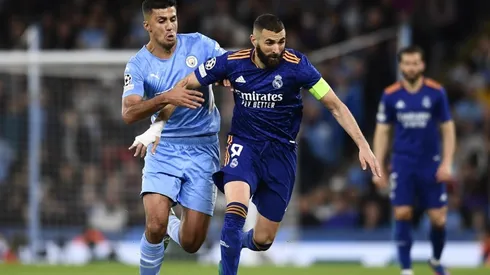 Rodri of Manchester City and Karim Benzema of Real Madrid