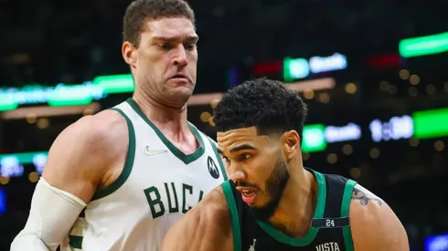 Jayson Tatum of the Boston Celtics and Brook Lopez of the Milwaukee Bucks