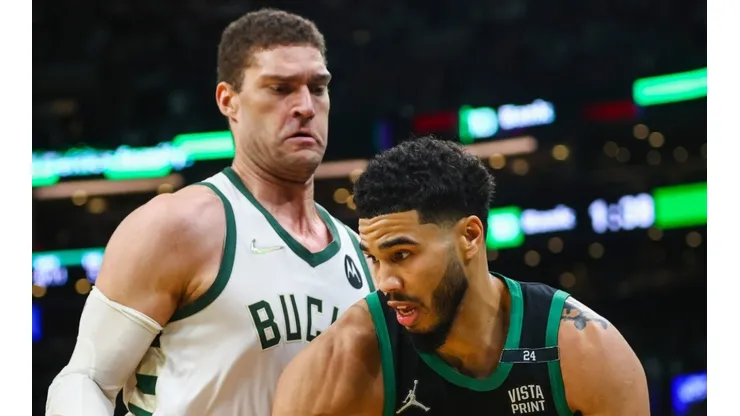 Jayson Tatum of the Boston Celtics and Brook Lopez of the Milwaukee Bucks