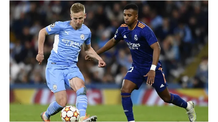 Oleksandr Zinchenko of Manchester City and Rodrygo of Real Madrid