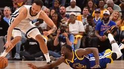 Draymond Green #23 of the Golden State Warriors and Kyle Anderson #1 of the Memphis Grizzlies
