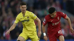 Luis Diaz of Liverpool disputes the ball with Juan Foyth of Villarreal
