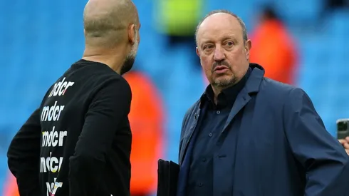 Pep Guardiola, Manager of Manchester City speaks with Football Manager, Rafael Benítez