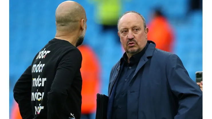 Pep Guardiola, Manager of Manchester City speaks with Football Manager, Rafael Benítez