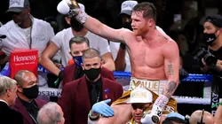 Canelo Alvarez celebrates his victory against Caleb Plant in November 2021