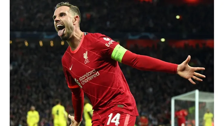 Liverpool captain Jordan Herdenson celebrates as his cross is deflected by Pervis Estupiñan into Villarreal's net.