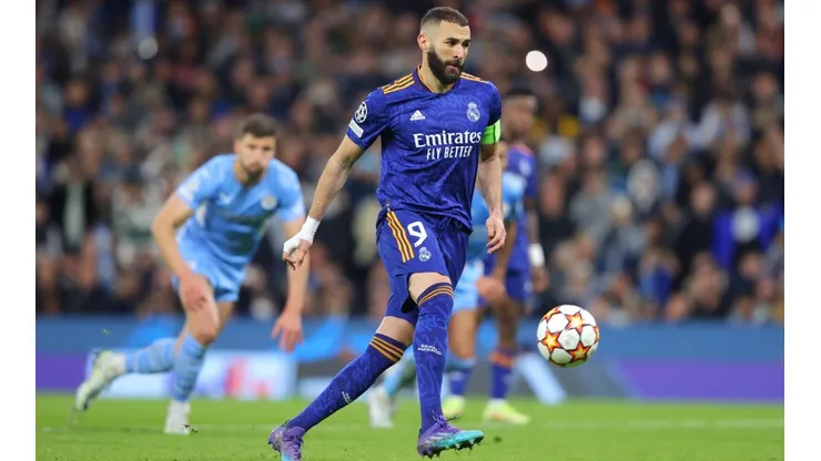 Karim Benzema scores a panenka penalty against Manchester City.