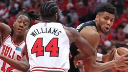 Giannis Antetokounmpo of the Milwaukee Bucks against Ayo Dosunmu and Patrick Williams of the Chicago Bulls