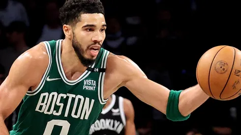 Jayson Tatum of the Boston Celtics steals the ball against the Brooklyn Nets