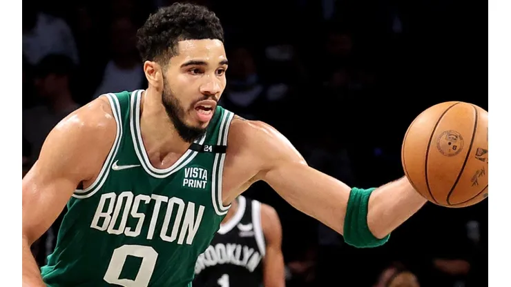 Jayson Tatum of the Boston Celtics steals the ball against the Brooklyn Nets