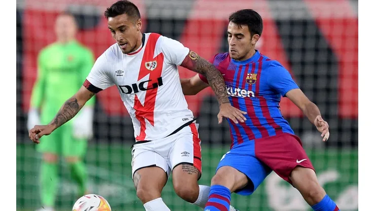 Óscar Trejo of Rayo Vallecano and Eric Garia of Barcelona