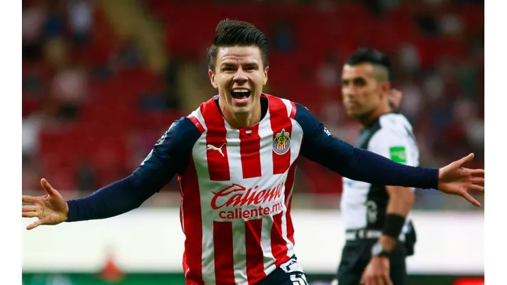 Pavel Perez of Chivas celebrates after scoring