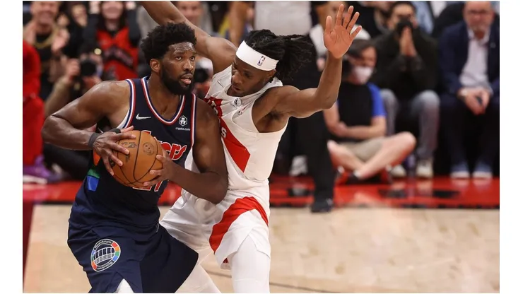 Toronto Raptors forward Precious Achiuwa defends Philadelphia 76ers center Joel Embiid