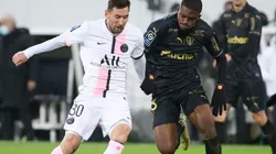 Lionel Messi of PSG and David Pereira Da Costa of Lens