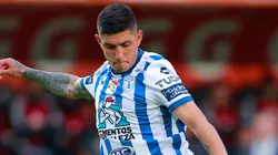 Victor Guzman of Pachuca drives the ball during the match between Pachuca and Tigres UANL
